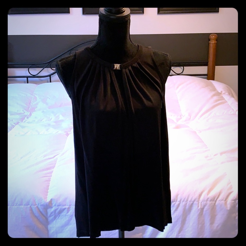 H&M black sleeveless shirt.